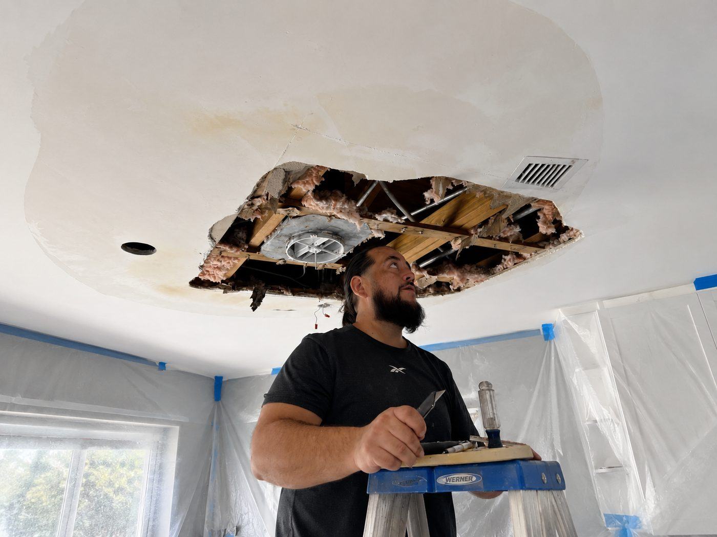 Ceiling drywall repair, sanded smooth and ready for paint